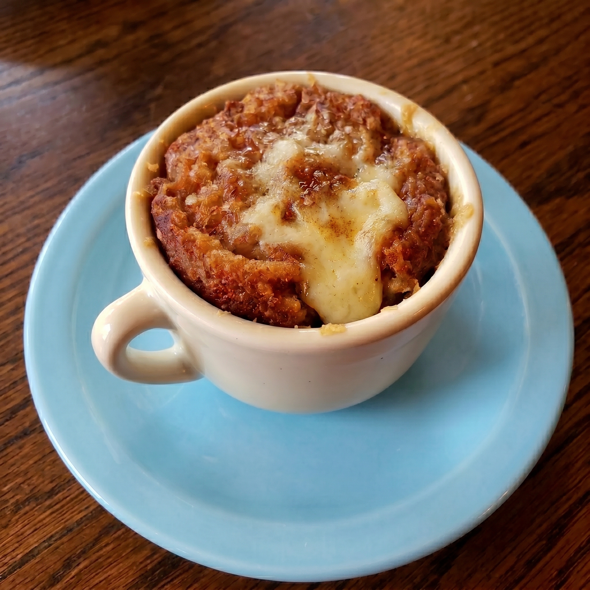 2-Minute Apple Mug Cake: The Ultimate Quick Microwave Dessert In today's fast-paced world, finding a delicious homemade dessert that doesn't require hours in the kitchen can feel like a challenge. That's where the 2-Minute Apple Mug Cake comes in — a game-changing single-serve treat that delivers all the cozy flavors of apple pie or apple cake in record time. Whether you're looking for a late-night snack, a quick breakfast indulgence, or an easy way to satisfy your sweet tooth, this microwave mug cake is about to become your new favorite recipe. This recipe stands out because it uses real fresh apples, warm cinnamon spices, and simple pantry staples. No fancy equipment needed — just a mug and your microwave. In this comprehensive guide, we'll walk you through everything: why this recipe works so well, step-by-step instructions, variations, tips for perfect results every time, and nutritional insights. Why You'll Love This 2-Minute Apple Mug Cake Mug cakes have exploded in popularity for good reason. They're portion-controlled, minimize cleanup, and deliver fresh-baked taste without turning on the oven. The 2-Minute Apple Mug Cake elevates the classic mug cake formula with juicy apple pieces and aromatic spices that evoke fall comfort food year-round. Key benefits include: Lightning-fast: Ready in under 5 minutes from start to finish. Minimal ingredients: Most are already in your kitchen. Customizable: Easy to adapt for dietary needs (gluten-free, egg-free, etc.). Single-serve perfection: No leftovers to tempt you later. Comforting flavor: Tastes like a mini apple cinnamon cake or warm apple pie filling. Ingredients for the Perfect 2-Minute Apple Mug Cake For one generous serving (using a standard 12-16 oz microwave-safe mug): For the Apples: 1/3 to 1/2 cup fresh apple, peeled and diced (about 1/2 medium apple — Honeycrisp, Gala, or Fuji work best) 1/2 tsp brown sugar 1/2 tsp ground cinnamon For the Cake Batter: 1 tbsp unsalted butter (or coconut oil for dairy-free) 2-3 tbsp milk (any kind — dairy or plant-based) 1 tbsp brown sugar (adjust for sweetness) 1/4 tsp vanilla extract 3-4 tbsp all-purpose flour (or gluten-free 1:1 blend) 1/4 tsp baking powder Pinch of salt Optional: 1/4 tsp ground nutmeg or cardamom for extra warmth Optional Toppings: Vanilla ice cream or whipped cream Caramel sauce drizzle Chopped walnuts or pecans Extra cinnamon sugar Step-by-Step Instructions Prepare the Apple Base Add the diced apple, 1/2 tsp brown sugar, and 1/2 tsp cinnamon into your microwave-safe mug. Stir to coat. Microwave on high for 45-60 seconds. This tenderizes the fruit and releases juices. Add Wet Ingredients Stir in the butter, milk, remaining brown sugar, and vanilla extract. Incorporate Dry Ingredients Add the flour, baking powder, salt, and extra spices. Stir until smooth. Microwave to Perfection Cook on high for 1 minute 30 seconds to 2 minutes. Check at 90 seconds — a toothpick should come out with a few moist crumbs. Rest and Serve Cool for 1-2 minutes. Top as desired and enjoy! Total Time: Under 5 minutes. Pro Tips for Mug Cake Success Use a large mug (12 oz+) to prevent overflow. Firmer apples hold their shape better. Avoid overcooking for maximum moisture. Best eaten fresh — reheat for 20-30 seconds if needed. Variations to Try Gluten-Free: Use 1:1 gluten-free flour. Vegan: Plant-based butter and milk. Oatmeal Version: Add 1-2 tbsp rolled oats. Caramel Apple: Add caramel sauce before and after cooking. Nutritional Information (Approximate per Serving) Calories: 450-550 kcal High in carbs from apple and flour, moderate protein and fat. FAQs Is it safe to make mug cakes in the microwave? Yes, it is completely safe. As long as you use a microwave-safe mug and cook the cake thoroughly, mug cakes are a quick and convenient dessert option. Why do I need to pre-cook the apples? Pre-cooking the apples softens them, releases their natural juices, and prevents excess moisture from making the cake soggy. It also concentrates the cinnamon-apple flavor. Can I make this 2-Minute Apple Mug Cake without eggs? Yes! This recipe is naturally egg-free. Baking powder provides the necessary lift for a fluffy texture. How do I prevent my mug cake from overflowing? Use a large enough mug (at least 12-16 oz) and avoid overfilling. Place a plate underneath in the microwave as a precaution. Can I make it gluten-free or vegan? Absolutely. Substitute with gluten-free flour blend for gluten-free, and use plant-based butter and milk for a vegan version. What is the best type of apple to use? Honeycrisp, Gala, or Fuji apples give the best sweet-tart balance and texture. Avoid overly mealy apples. Why is my mug cake dense or rubbery? This usually happens from overmixing the batter or overcooking. Stir just until combined and start checking at 90 seconds. How long does the 2-Minute Apple Mug Cake last? It’s best enjoyed immediately. You can store it in the fridge for up to 24 hours and reheat in the microwave for 20-30 seconds. This 2-Minute Apple Mug Cake proves that gourmet desserts don't need hours or complicated techniques. It's comforting, aromatic, and incredibly versatile.